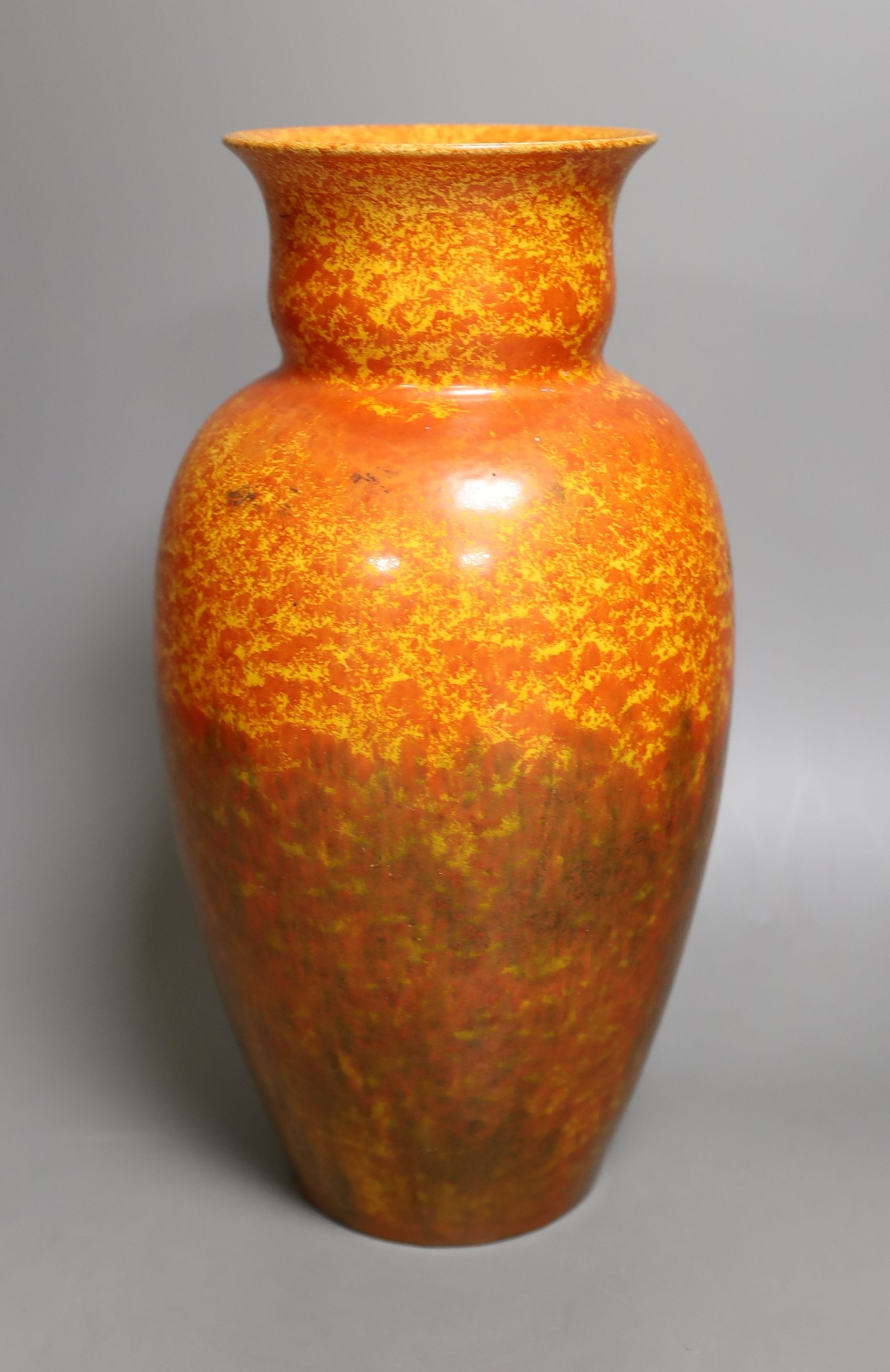 A Pilkington's Royal Lancastrian orange mottle glazed vase, 29 cms high.